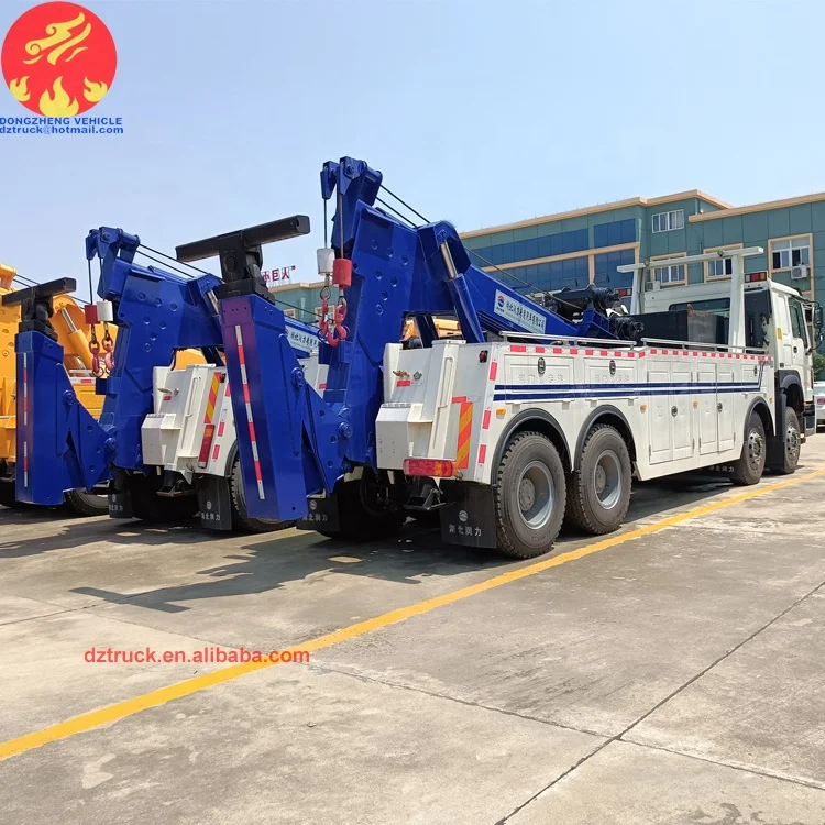 Sinotruck howo 8X4 30tons 50tons LHD heavy duty Dragging and lifting multifunction road wrecker rescue truck fow sale