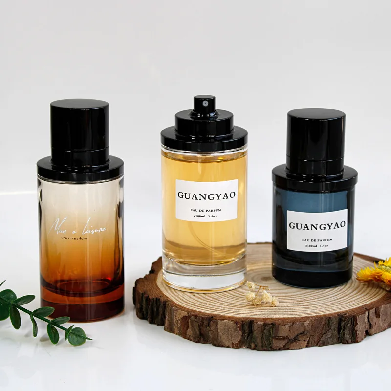 Cylindrical 50 ML 100 ML pressing spray glass perfume bottle empty portable perfume dispenser bottle with magnetic cap