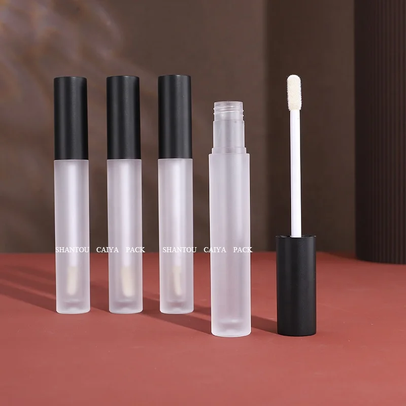 Shantou cosmetic packaging manufacturer wholesale 3ml long neck empty frost black silver round lip gloss balm tube heart brush