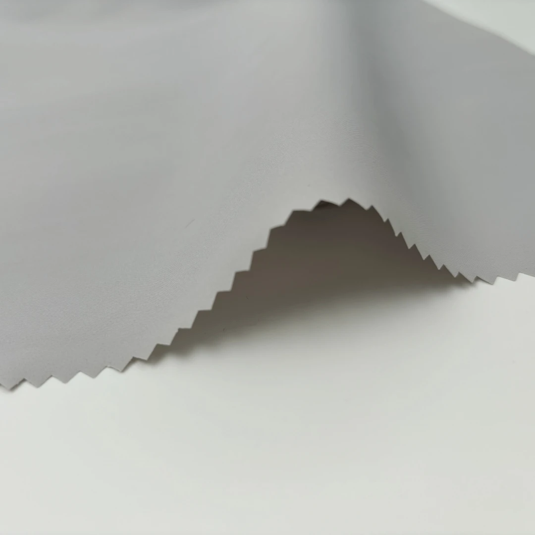 Customized Color 50D Pongee Fabric Waterproof 300T Bonded TPU 100% Polyester Fabric For Down Jacket Coat