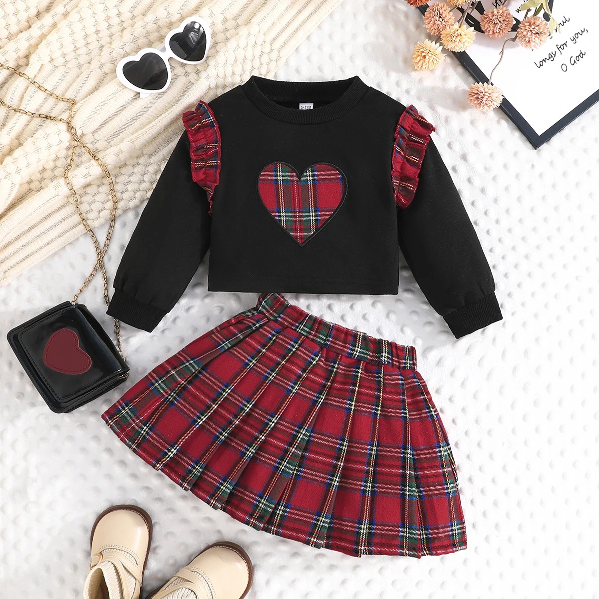 Exquisite ruffled long sleeved heart-shaped pattern top with fashionable red checkered pleated skirt two-piece set