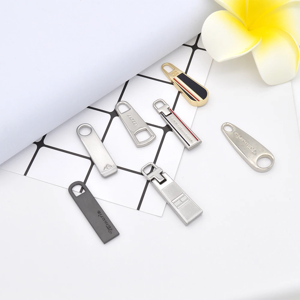 Fashion handbags and bags custom metal zinc alloy zipper slider hallow angel zipper puller for bags