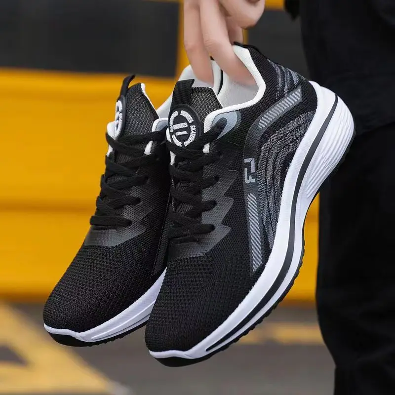 Factory direct sports shoes men 2023 autumn new flying woven breathable new running shoes Korean version of student shoes