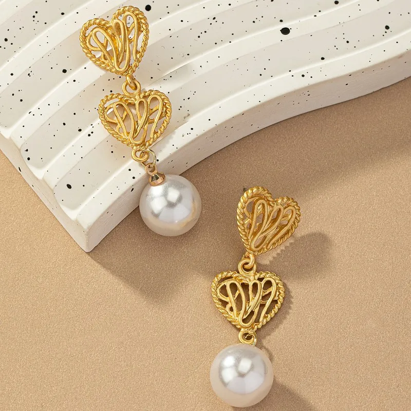 Trade assurance suppliers gold plated pearl drop earrings jewelry fashion hollow heart shape earrings for women