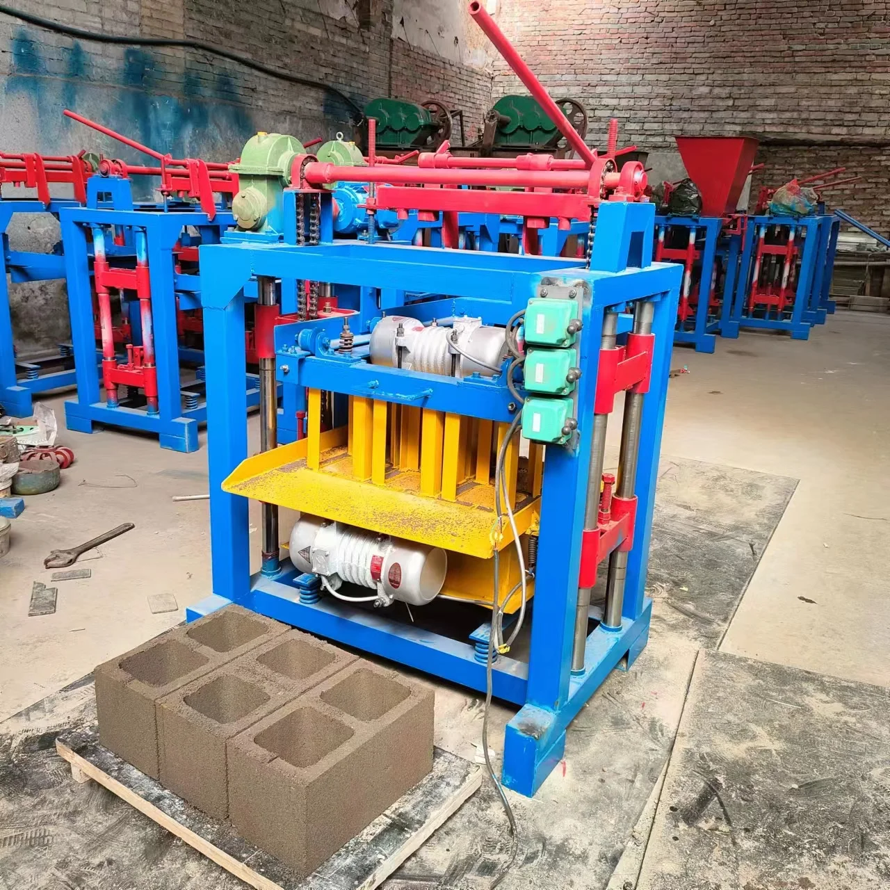 Electrical second hand low cost clay mud silica sand standard brick making machine for sale supplier