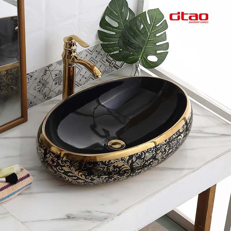 Factory direct countertop oval shape art basin ceramic hand wash basin black gold luxury bathroom sinks