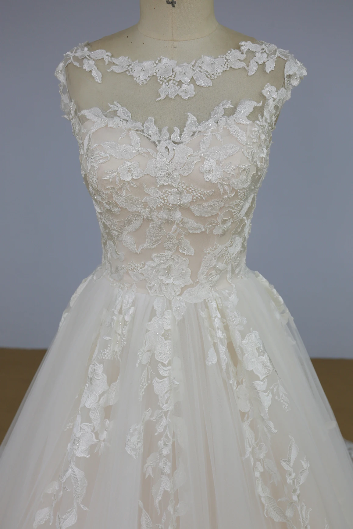 Soft pink bridal dress cap sleeves beaded lace wedding