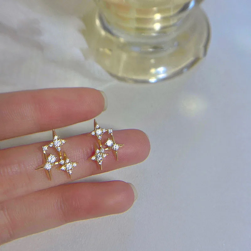 Diamond-studded star earrings Female silver needle niche design sense of high-grade temperament simple cold wind cross star