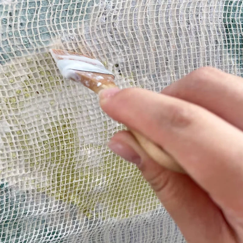 Environmentally friendly durable secondary mesh backing fabric for tufting carpet