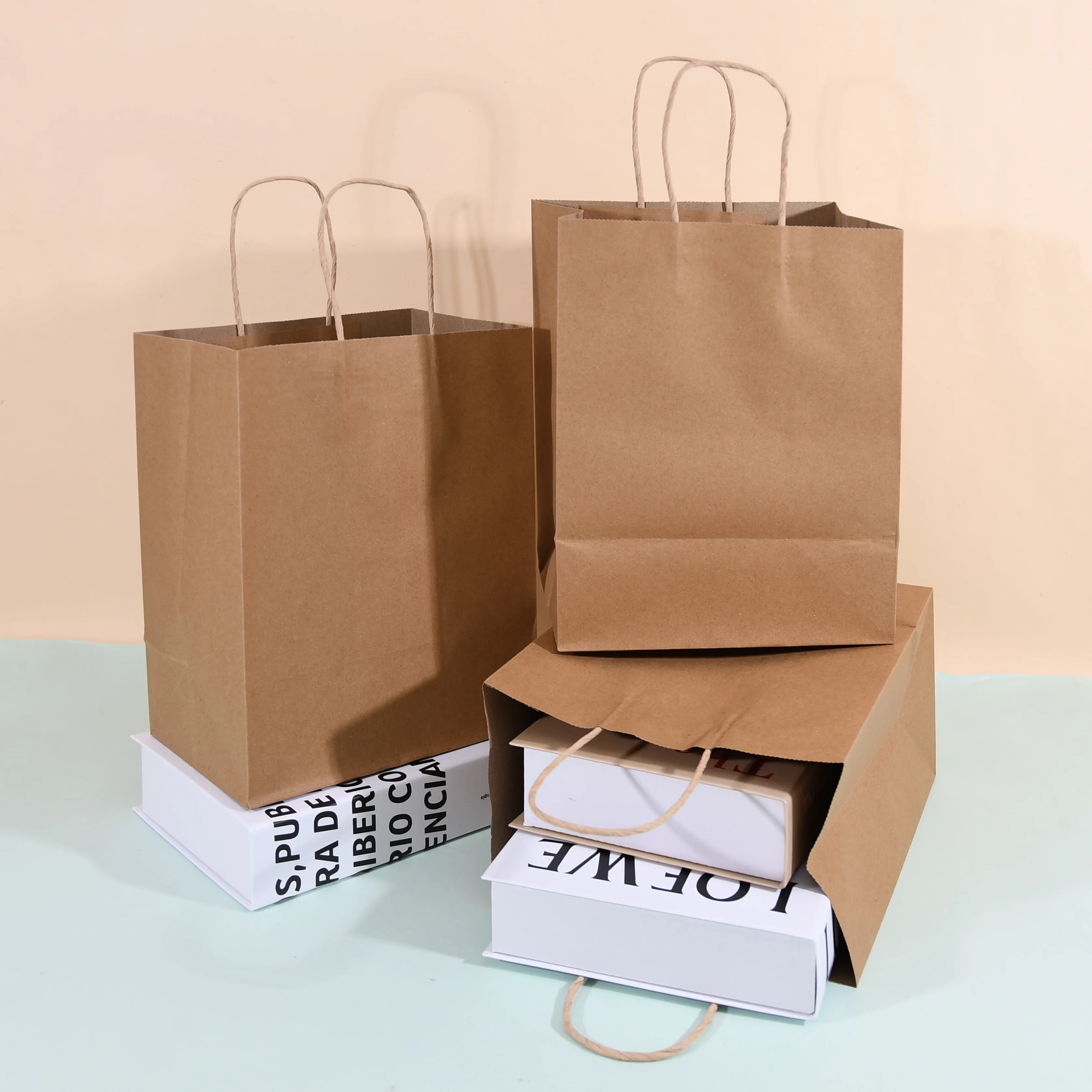 Eco-friendly Reinforced Handle Craft Paper Bags Custom Printed Logo Solid Durable Bottom Brown Kraft Paper Bag
