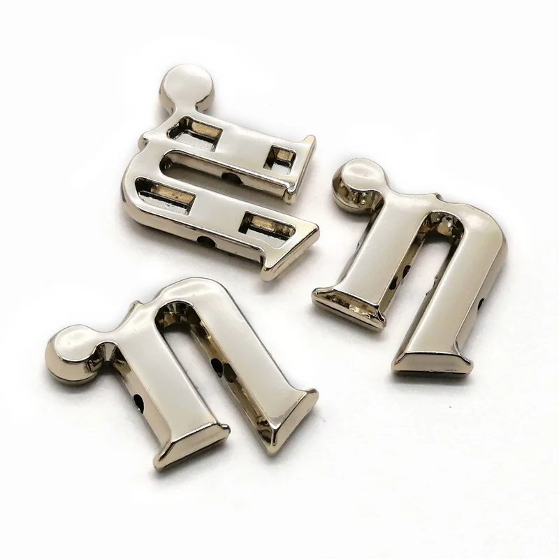 14 Years Factory OEM Custom Logo Labels For Handbags Steel Nameplate Oval Metal Logo Metal Sew Labels Metal Label Clothing