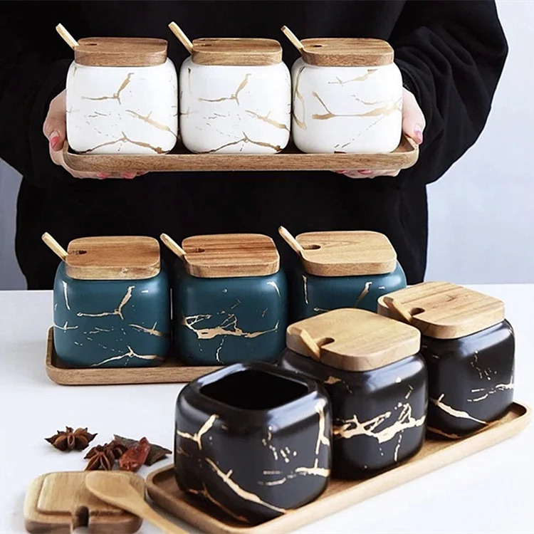 
Wholesale sugar spice salt seasoning condiment kitchen storage jar set marble ceramic spice jar with wood lid and tray 