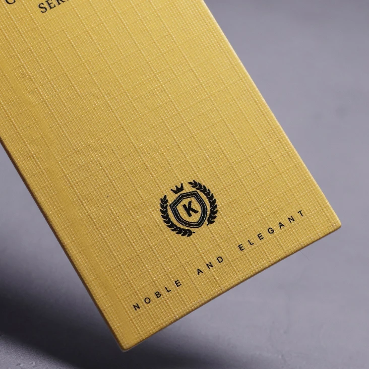 
Best Selling Printing embossed Textured Paper Swing Hang Tag For Clothing 