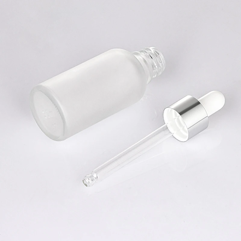 Custom essential oil packaging 1oz 30ml serum high end cylinder transparent frosted white plastic dropper bottle