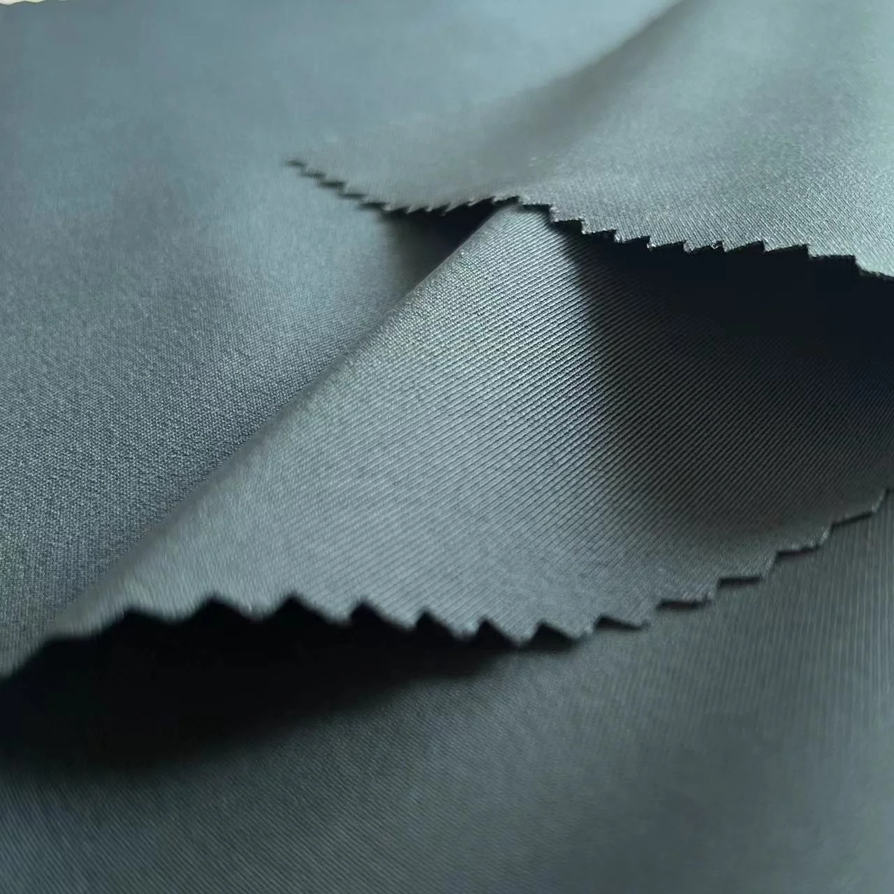 Smooth 2/1 Twill Polyester Filament biflex Elastic Waterproof Breathable Spandex Fabric for pants