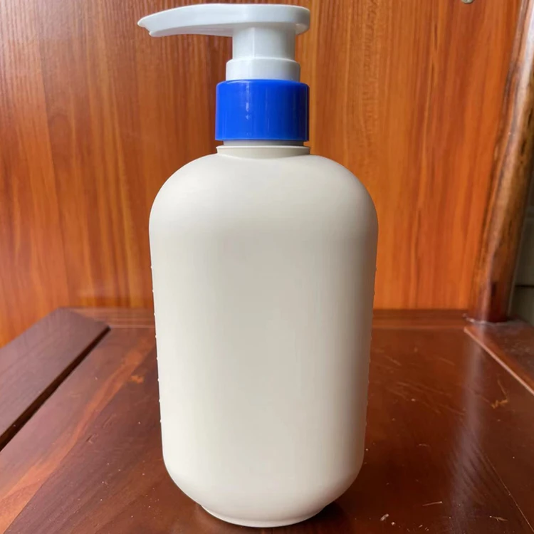 Wholesale custom 500ml plastic white HDPE round lotion bottle for shampoo body wash skin care packaging