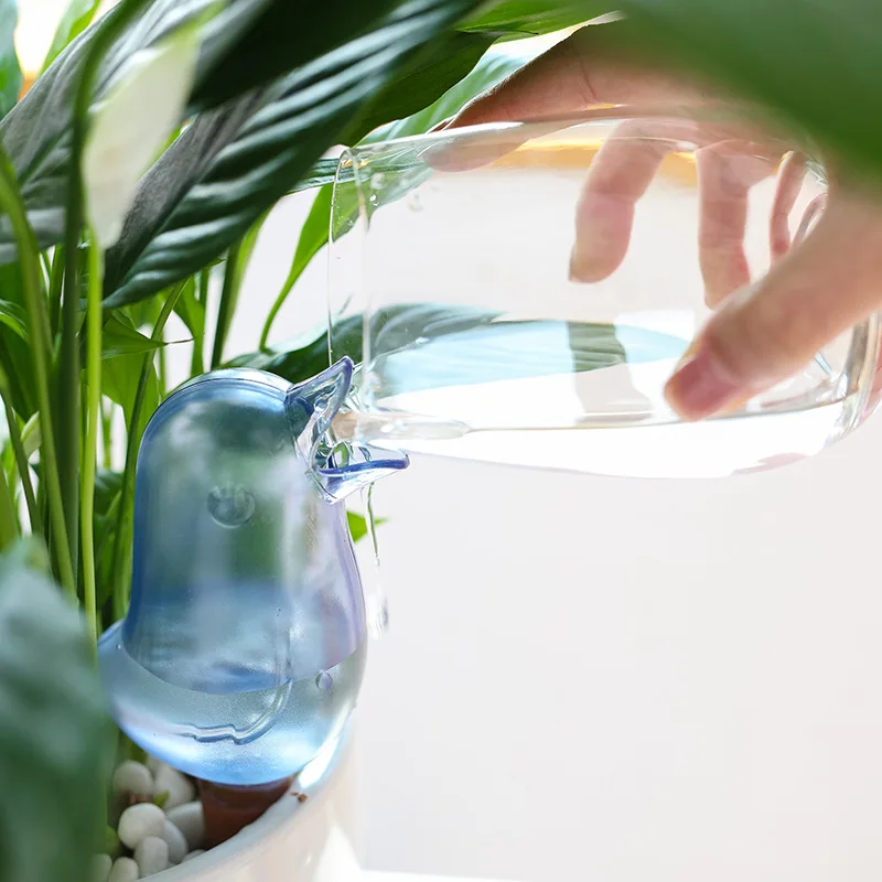 
2021 new transparent automatic dripper gardening household automatic watering bird shape lazy watering flower pot product description