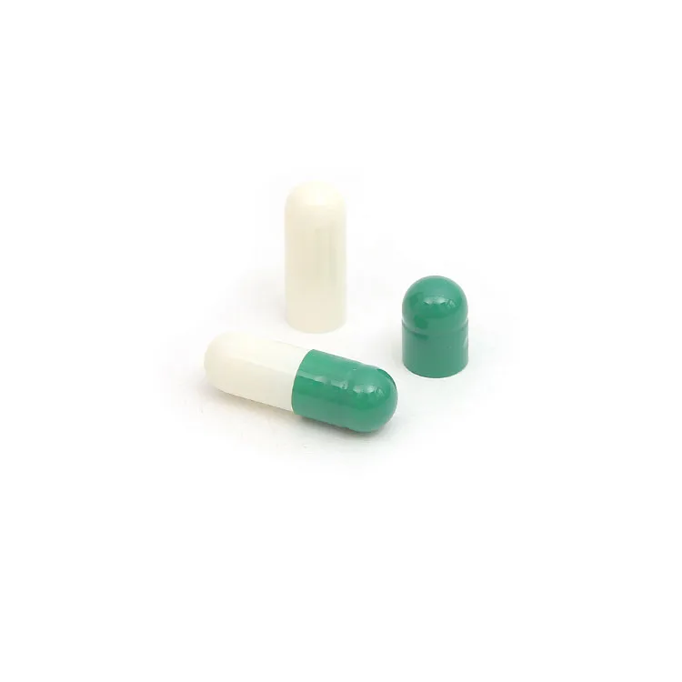 Separated size 1 empty gelatin capsules blue and white color