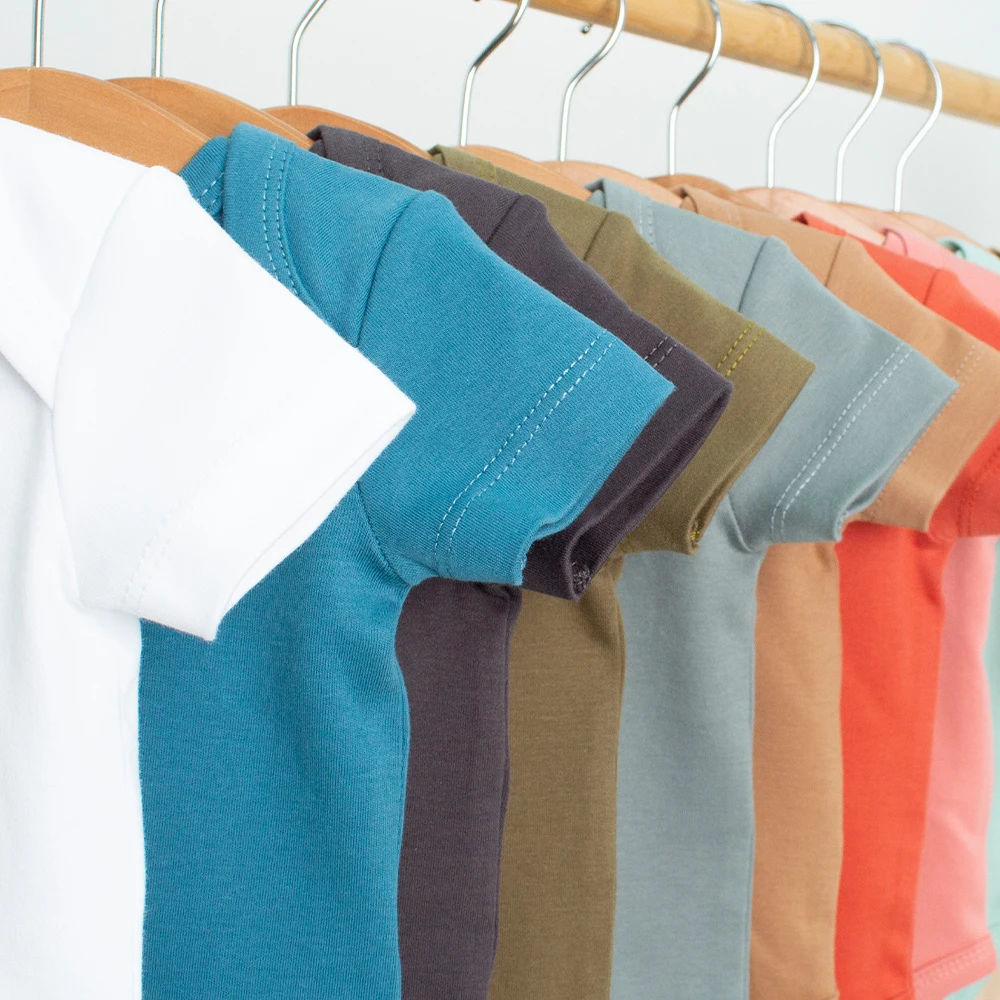 OEM 100% Organic Cotton Soild White Color Unisex Newborn Clothes Infant Bodysuit Baby Pajama Romper Baby Onesie