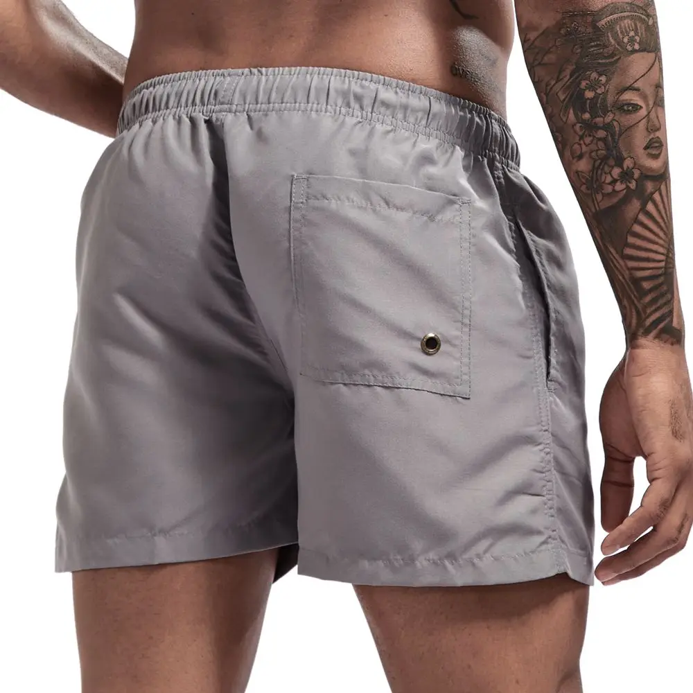 
quality men fashion beach pants 100% polyester breathable solid color large size quick-drying swimming fitness shorts for men 