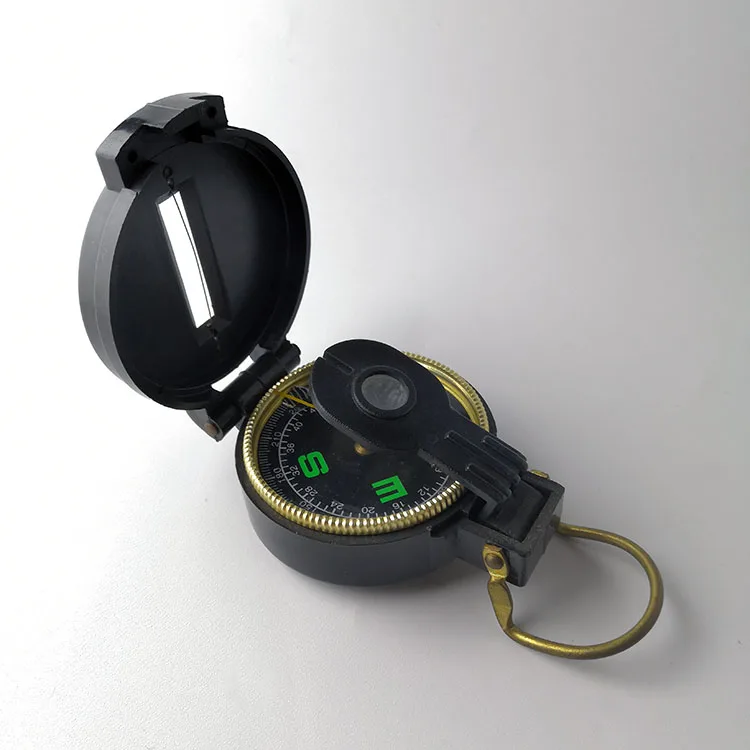 Fixed instrument with multi-functional hand-held cross-country exploration equipment and magnifying glass compass