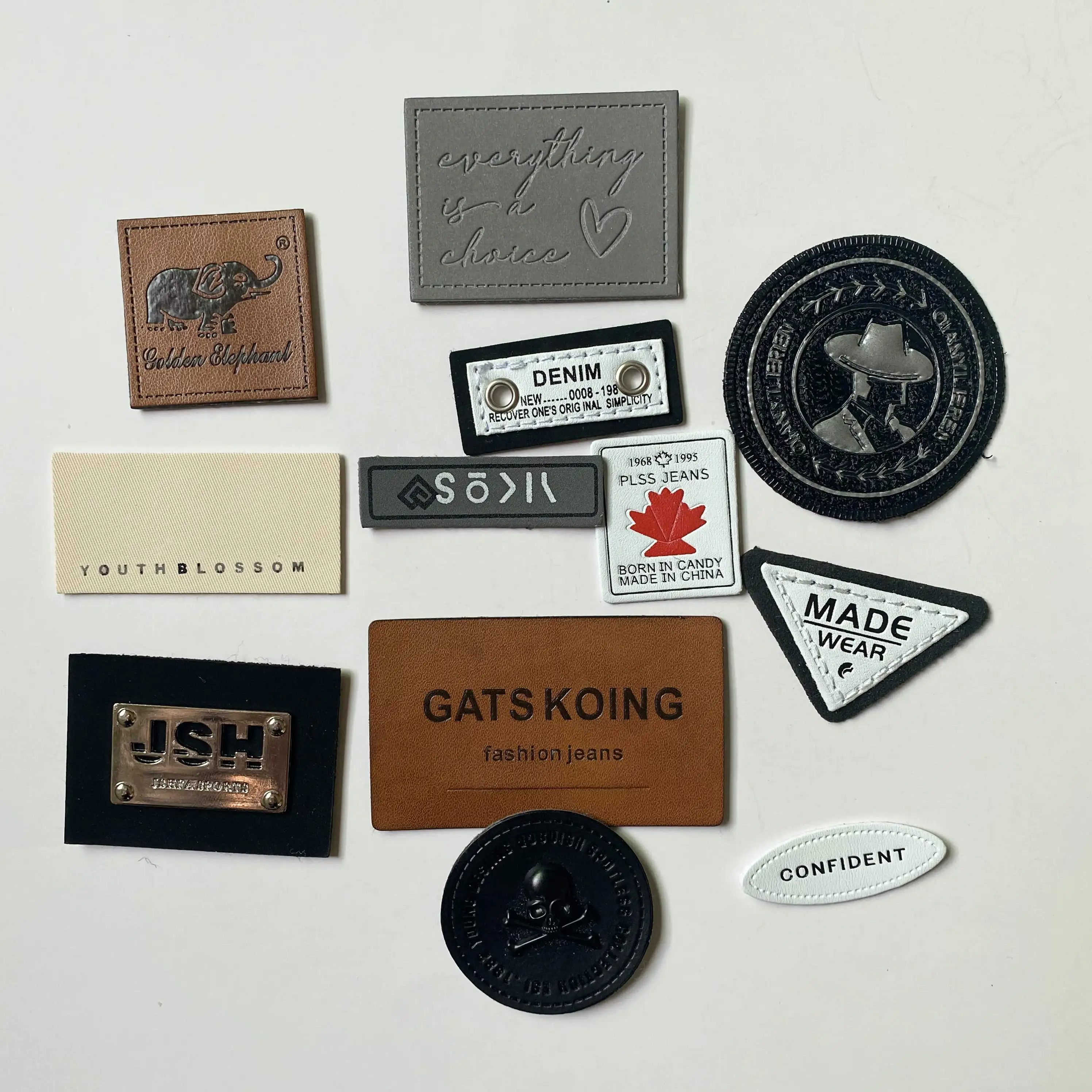 High Quality Hot Stamping engraved White Custom Logo Embossed Real Leather Labels Patches for Jeans and Bags