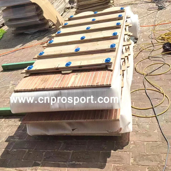 Manufacturer carefully manufactures portable solid wood sports floor basketball squash court maple oak birch beech gym