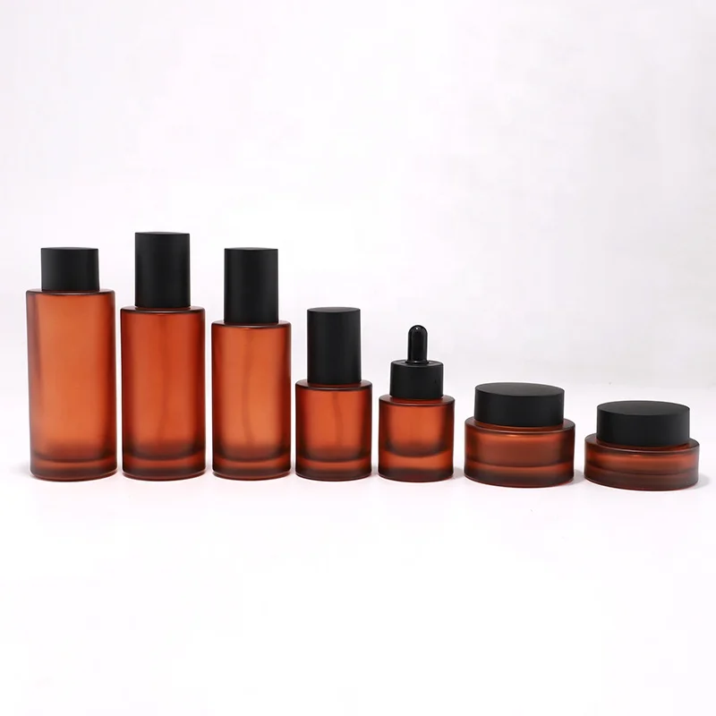 New Arrival Cosmetic Skincare Packaging Lotion Pump Bottle and Cream Jar Oil Dropper Toner Glass with Brown Frosted Amber Color