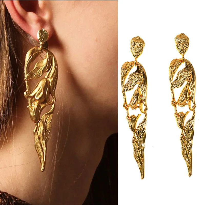 Fashion design alloy three-dimensional embossed golden lily wings earrings long earrings trendy jewelry