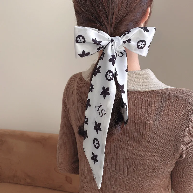 Thin and narrow strip tie women 2021 French retro hair scarf ins wind gentle and elegant hair band tie strap