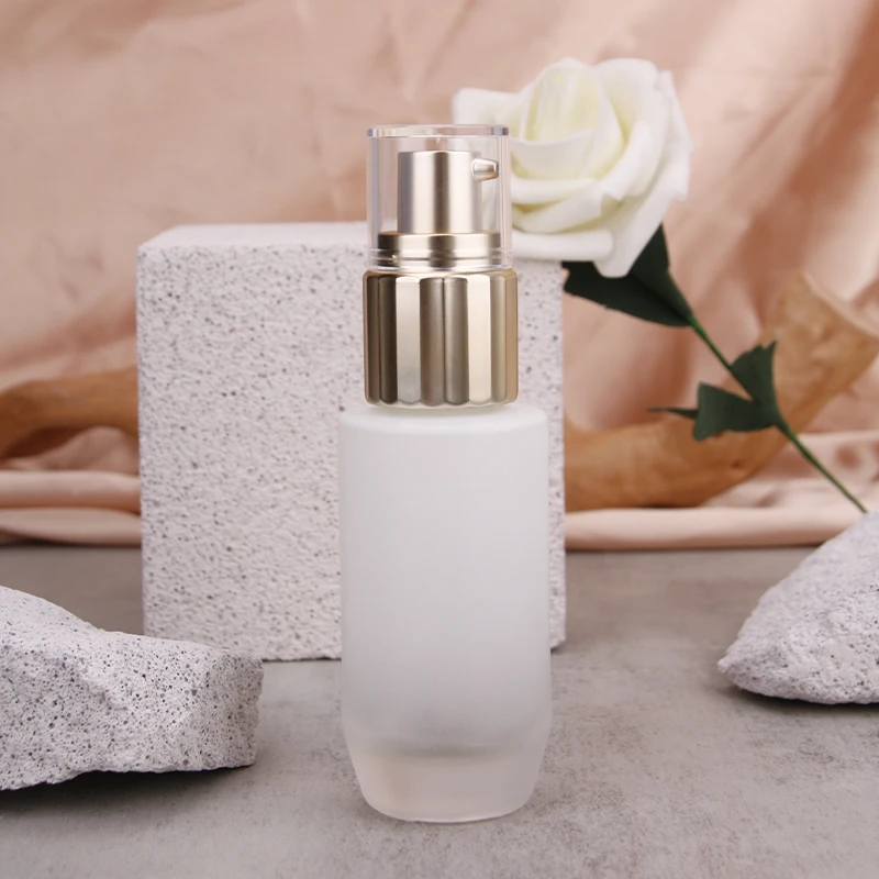 Unique Clear Glass Bottle for Cosmetic Lotion  Glass Lotion Pump Bottle 120 ml with Frosted Glass Bottle Lotion Gold Cap