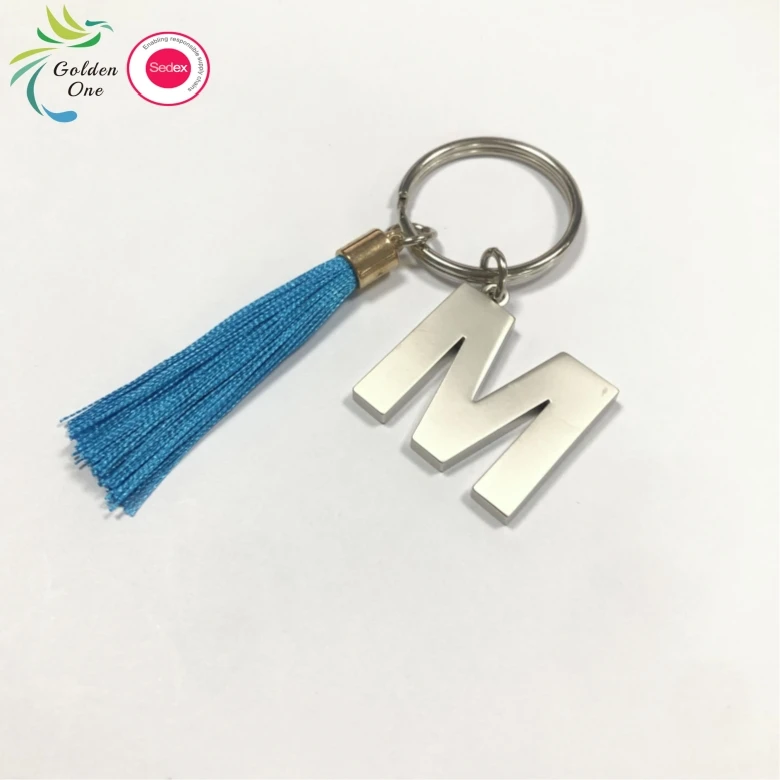 new design manufacturer colored fringe gift key chain 26 letters printing logo fashion metal keychain for bags