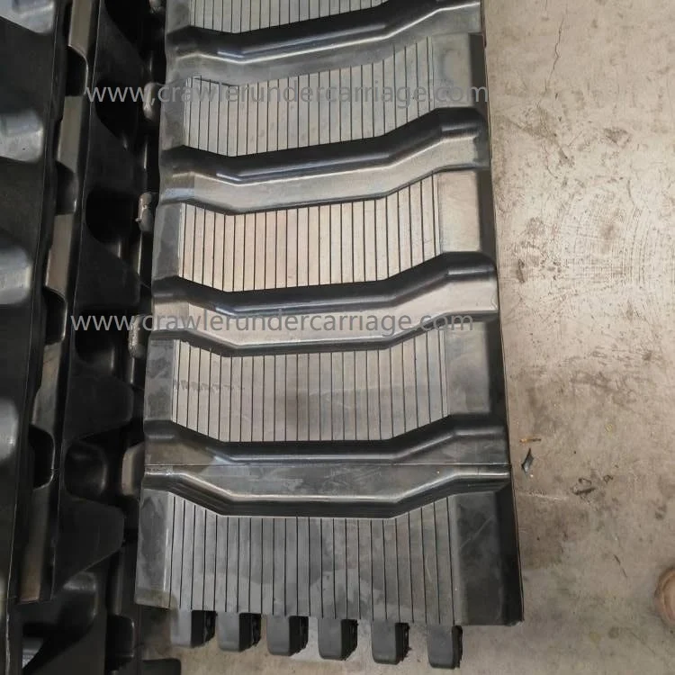 Резиновая дорожка 10x6x27( 340x152 4x27) для Bobcat 444 500 600 700 S450 над шинами