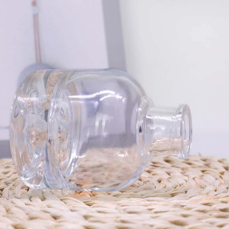 In stock  100ml 150ml round flat bottom glass wine bottle iceberg design with light color polymer cork