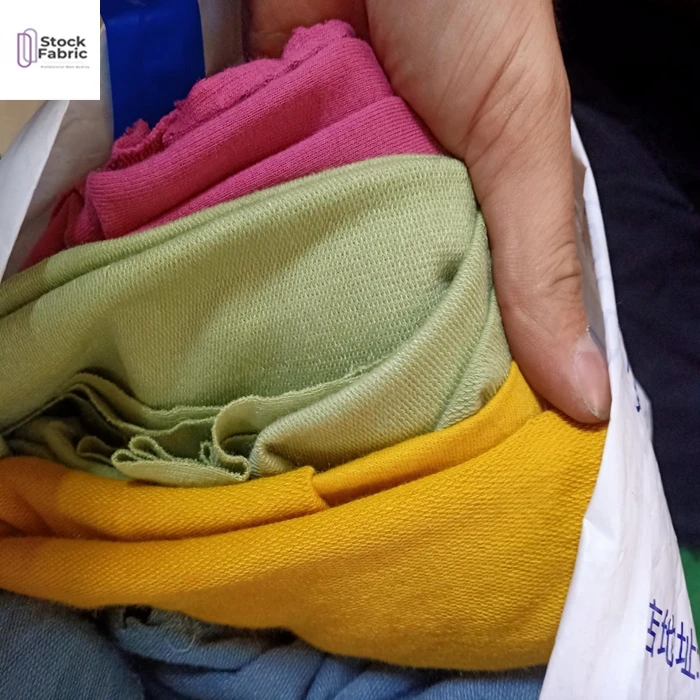 Hot selling knitted CVC french terry batch solid stocklot fabric in Shaoxing textile in China