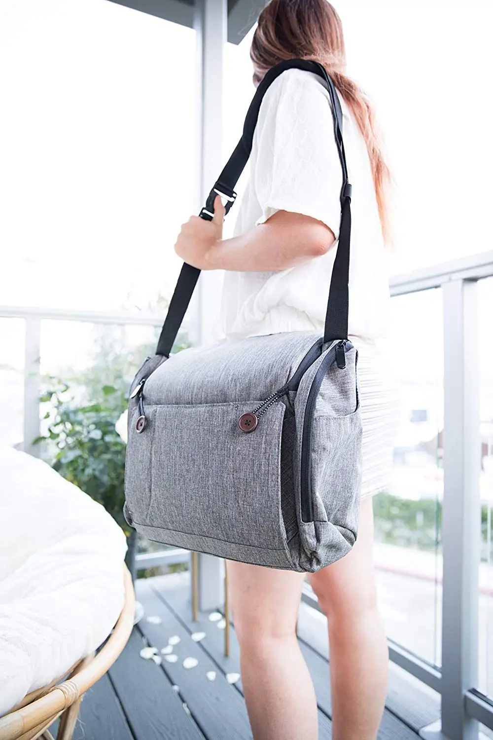 Travel Booster Seat  Adjustable straps quickly secure travel booster to chair