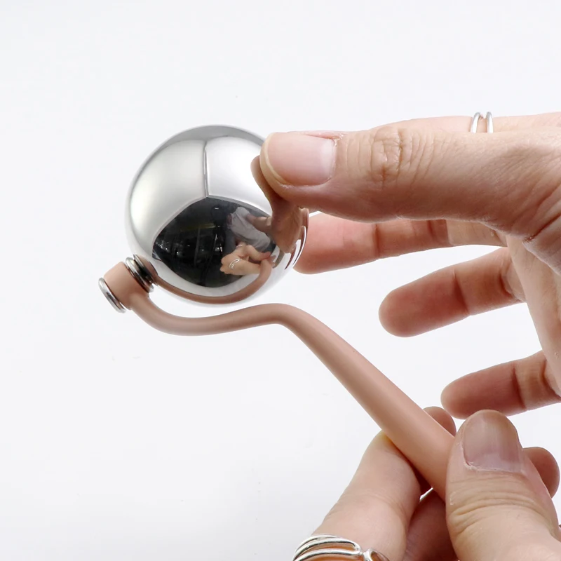 New design Face Cooling Massage Stainless Steel Ice Globe Facial Roller 360 Degree Rotating Facial Ice Globe