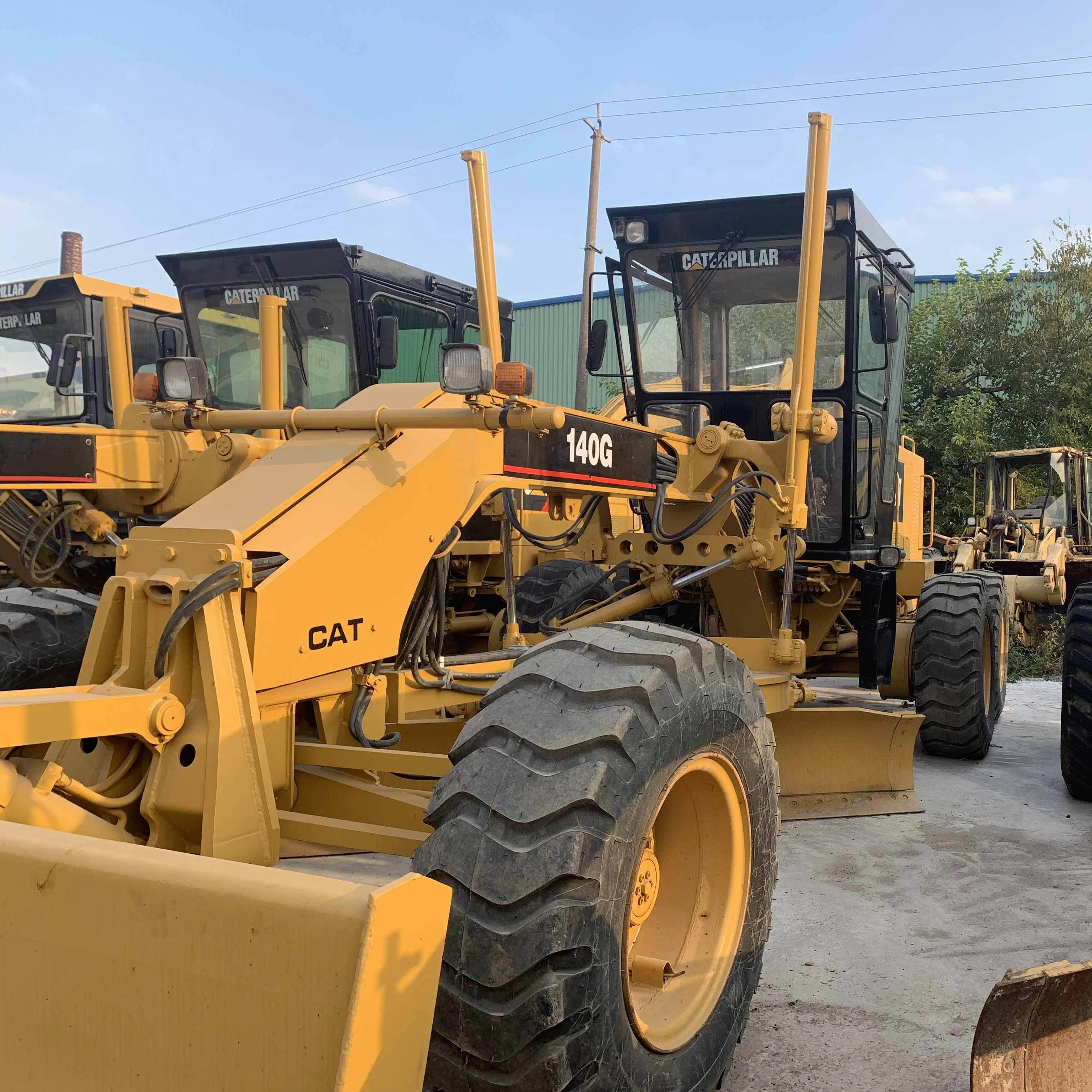 Подержанный автогрейдер CAT 140G с рыхлителем/CAT 140