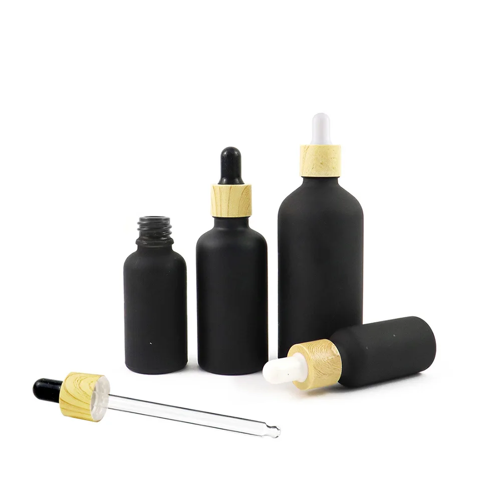 Wholesale 5mL 10mL 15mL 20mL 30mL 50mL 100mL Matte Frosted Black Dropper Bottles With Bamboo Cap Calibrated Glass Pipette