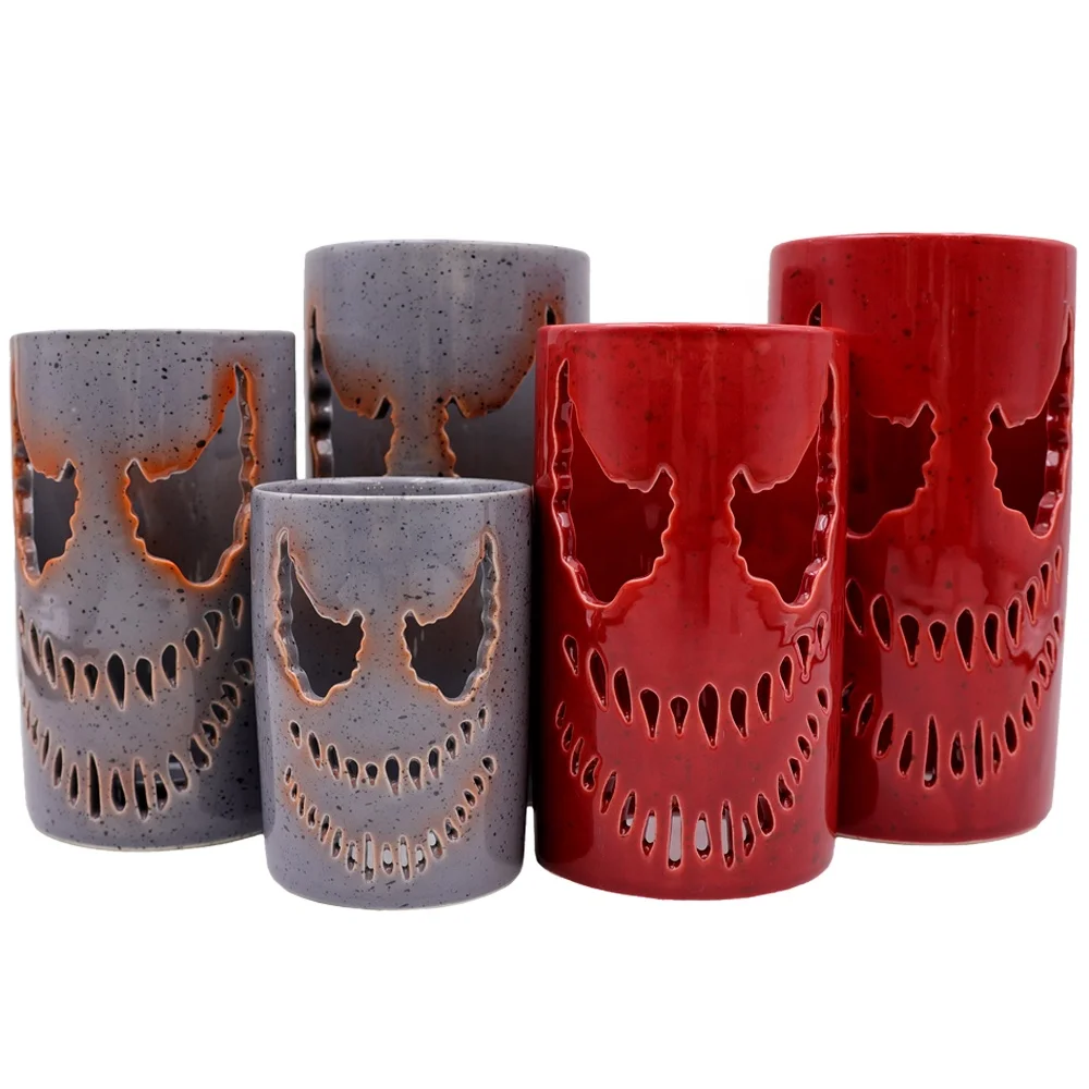Custom Halloween home decor tea light holder ceramic carved vicious evil venom face tea light candle lantern with invisible base