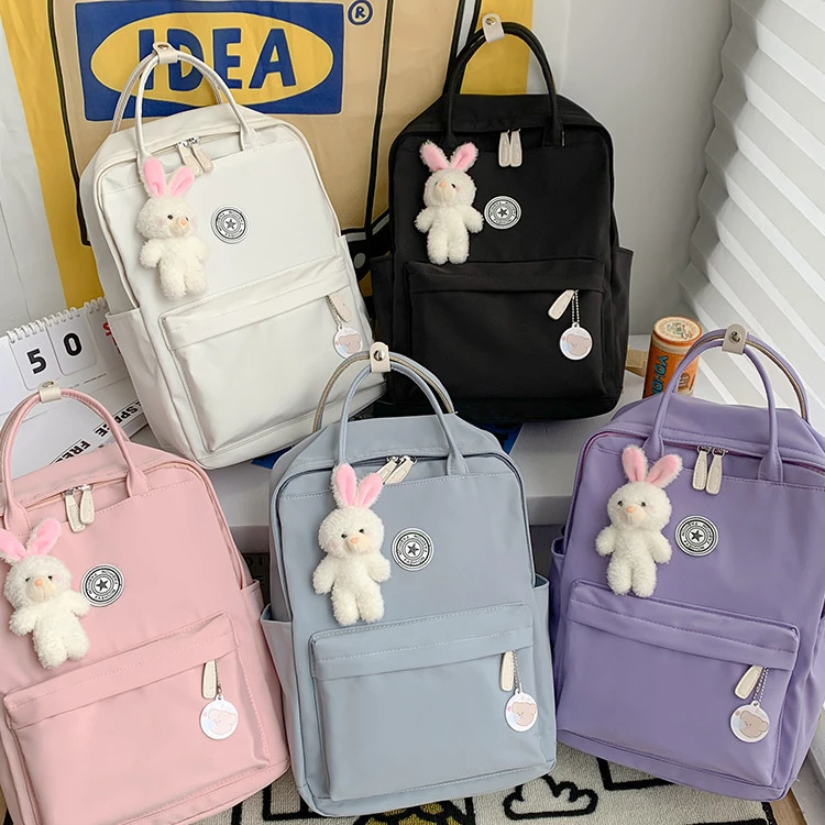 2023 fashion wholesale large capacity custom logo unisex waterproof black nylon laptop backpacks school bags for women girls
