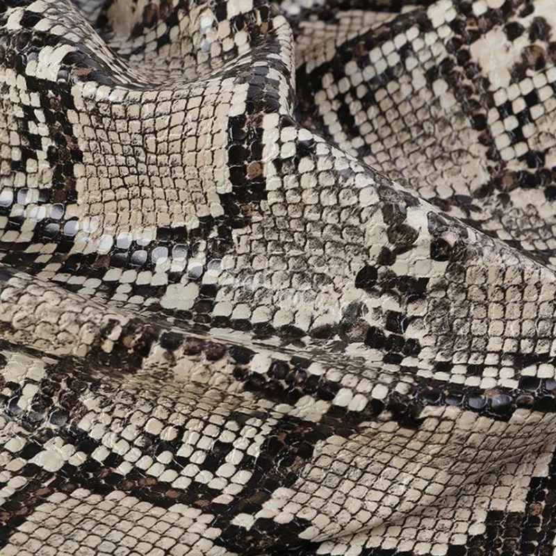 synthetic leather python pattern  is used for luggage, decoration, shoe materials, handbags, furniture soft bags, belts, etc.