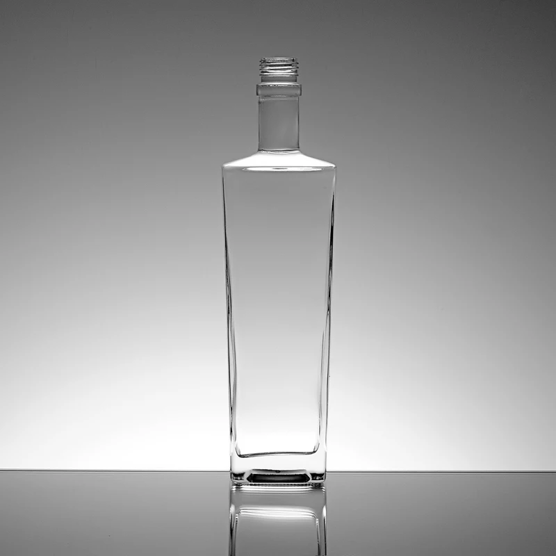 Cosmetic design wholesale 700ml 750ml glass vodka bottle empty whisky whiskey spirit wine glass bottle for liquor