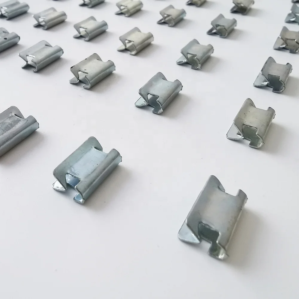 metal clips that secures a piece of armor and an bellows cover