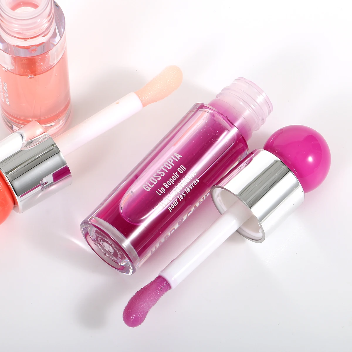 Wholesale  plump  pout  Oil Hydrates Lip Plumping Booster Gloss moisturizing Non-sticky lip oil gloss