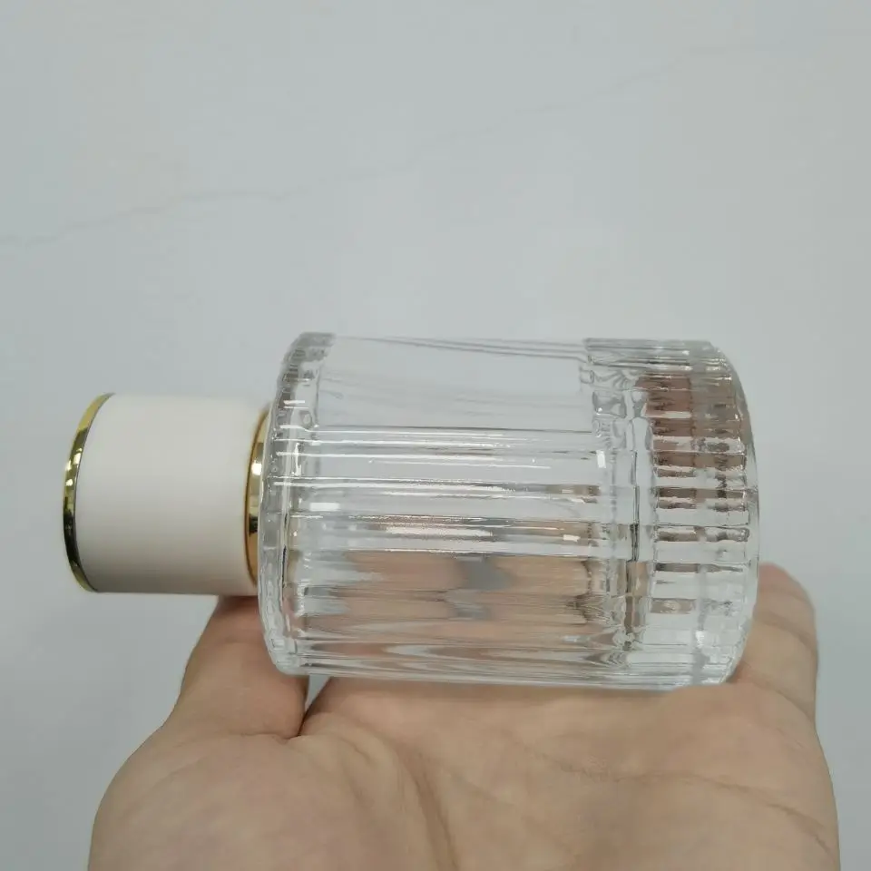 Custom Logo Luxury Glass Spray Bottle 30ml 50ml Cylindrical Shape Clear Crimp Perfume Bottle