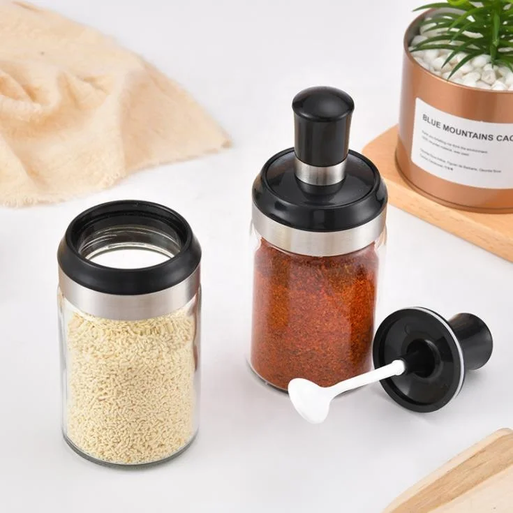 8 OZ Transparent glass seasoning jar with integrated spoon and lid for household use