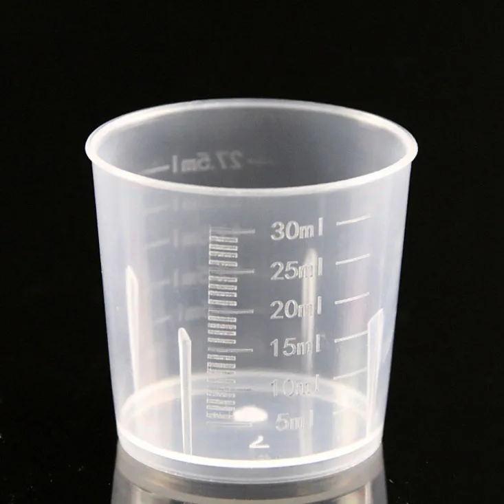 Hot sale plastic 30 ml measuring cup with scale for sale