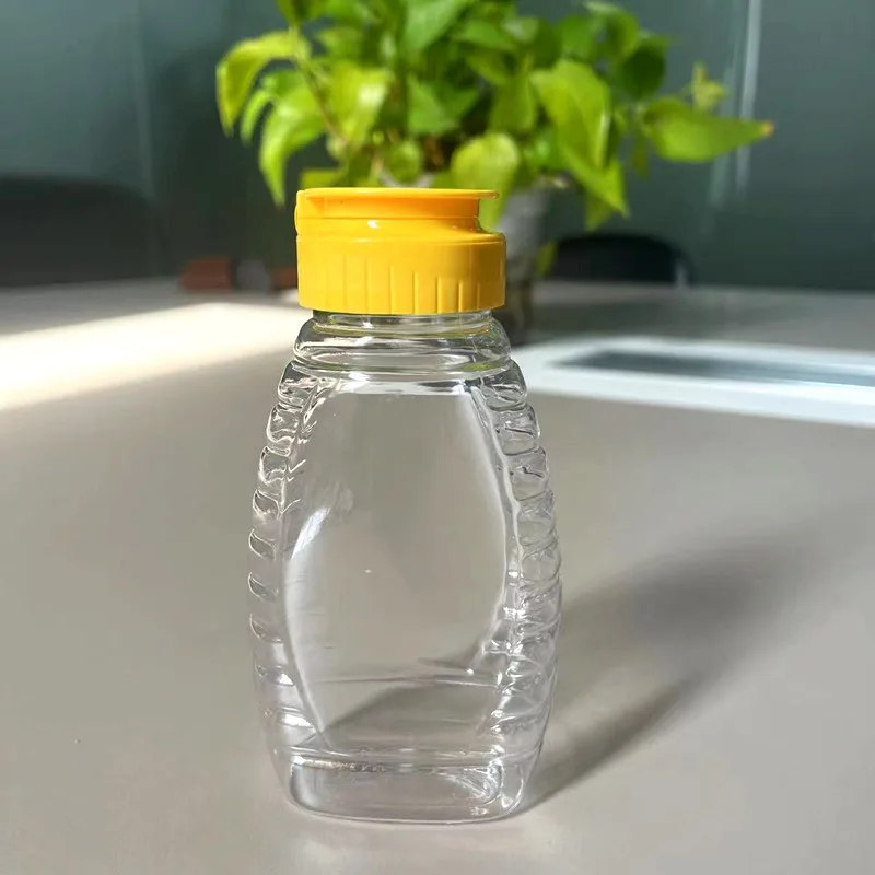 plastic sauce honey bottle with spout nozzle flip top lid squeeze bottle plastic ketchup bottle