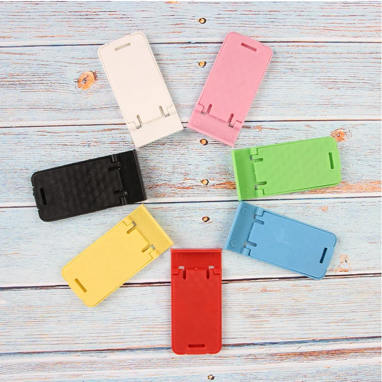 Портативный складной держатель для мобильного